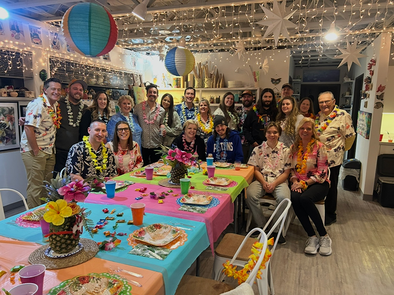 Group photo of Hawaiian party